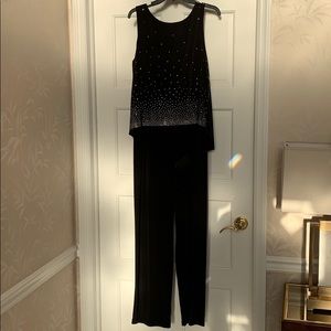 Black and silver jumpsuit brand new
